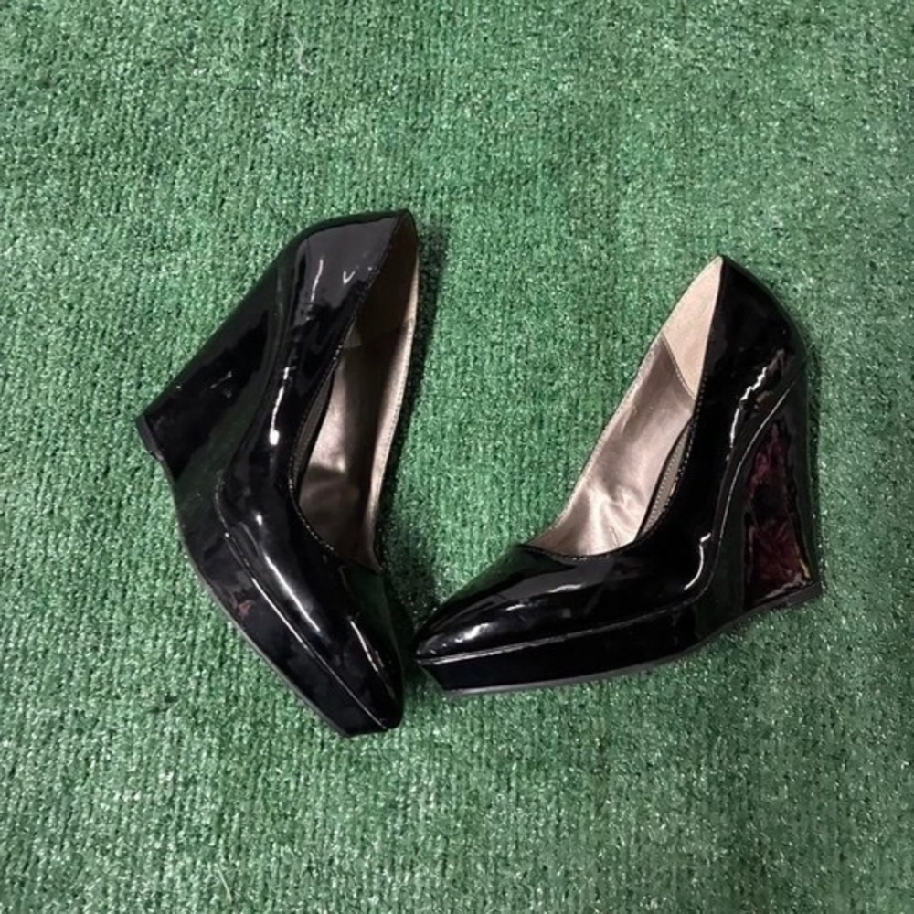 Sleek Black Patent Leather Wedge Heels